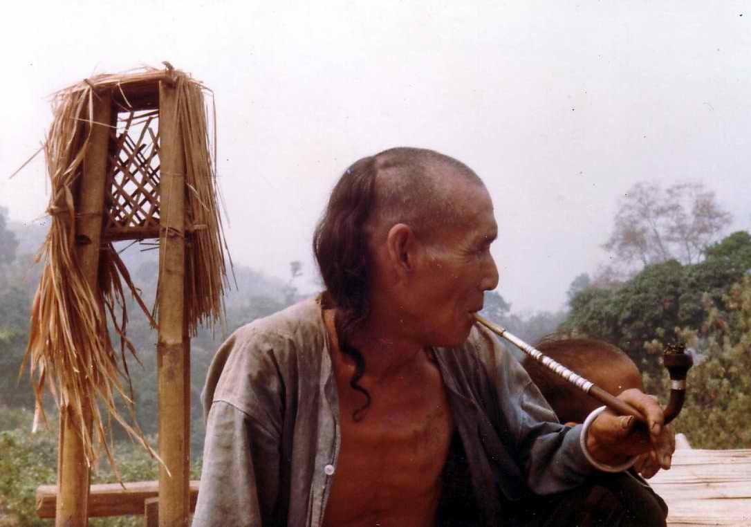The Opium Trade in Thailand, 1908 - 1940 1 Akha Man With Opium Pipe